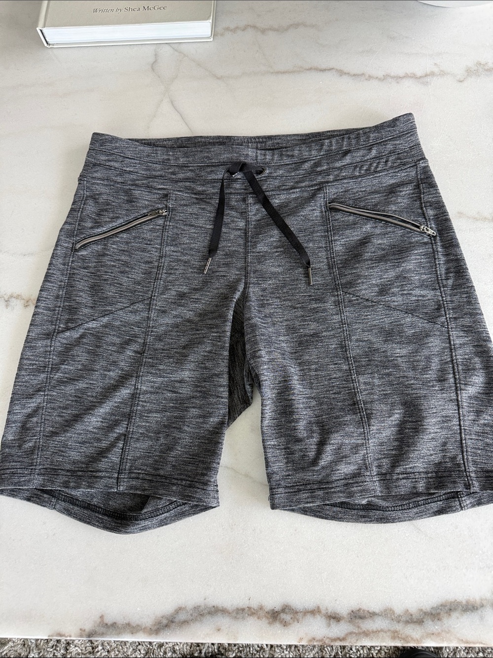 Athleta women’s Heathered Charcoal Athletic Shorts with Zip Pockets